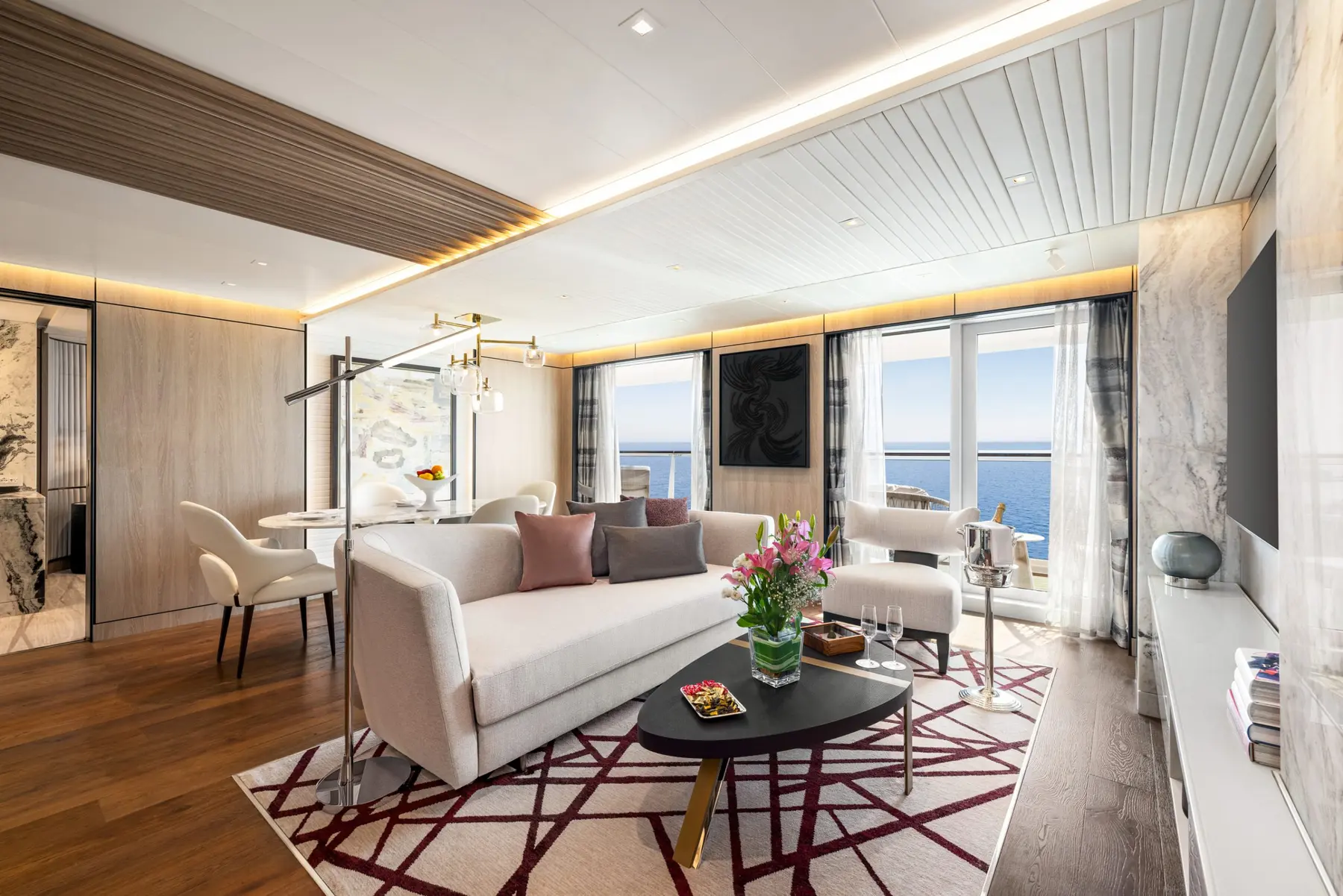 Living room inside an Oceania Suite aboard Allura
