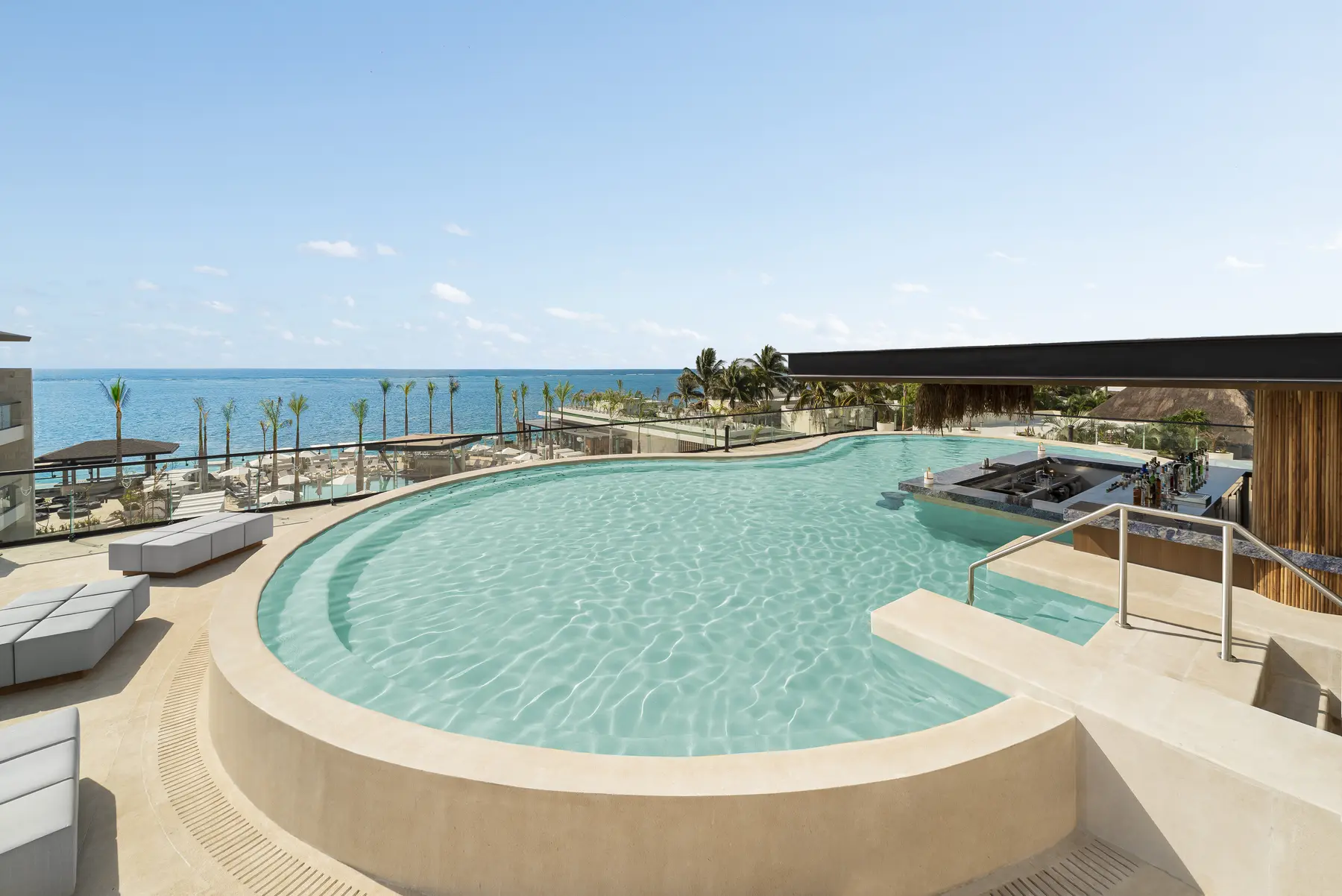 Ocean-view rooftop Jacuzzi Lounge at Desire Riviera Maya Resort