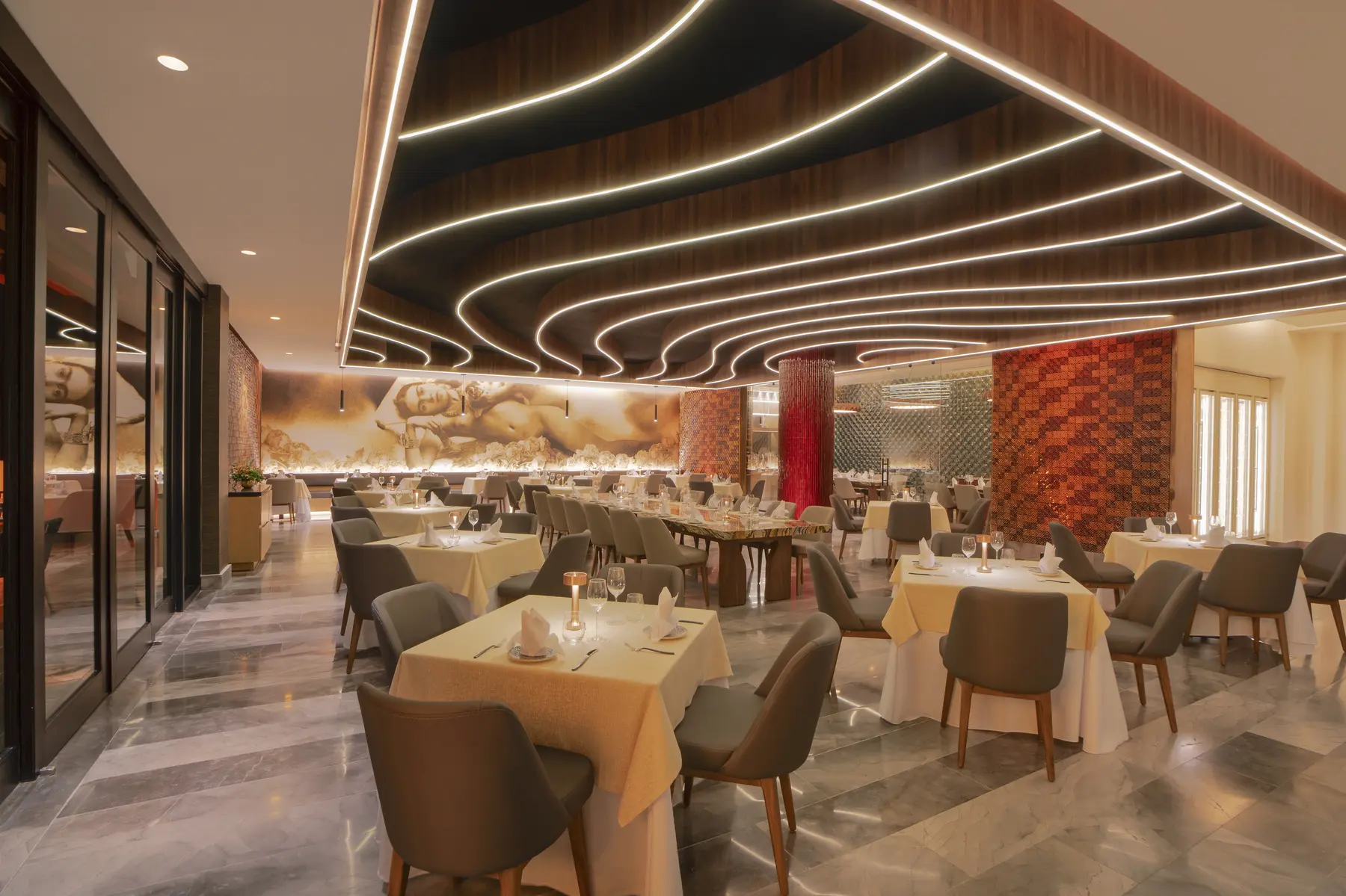 Kahlo restaurant dining room at Desire Riviera Maya Resort